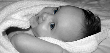 Babymassasje spedbarnsmassasje